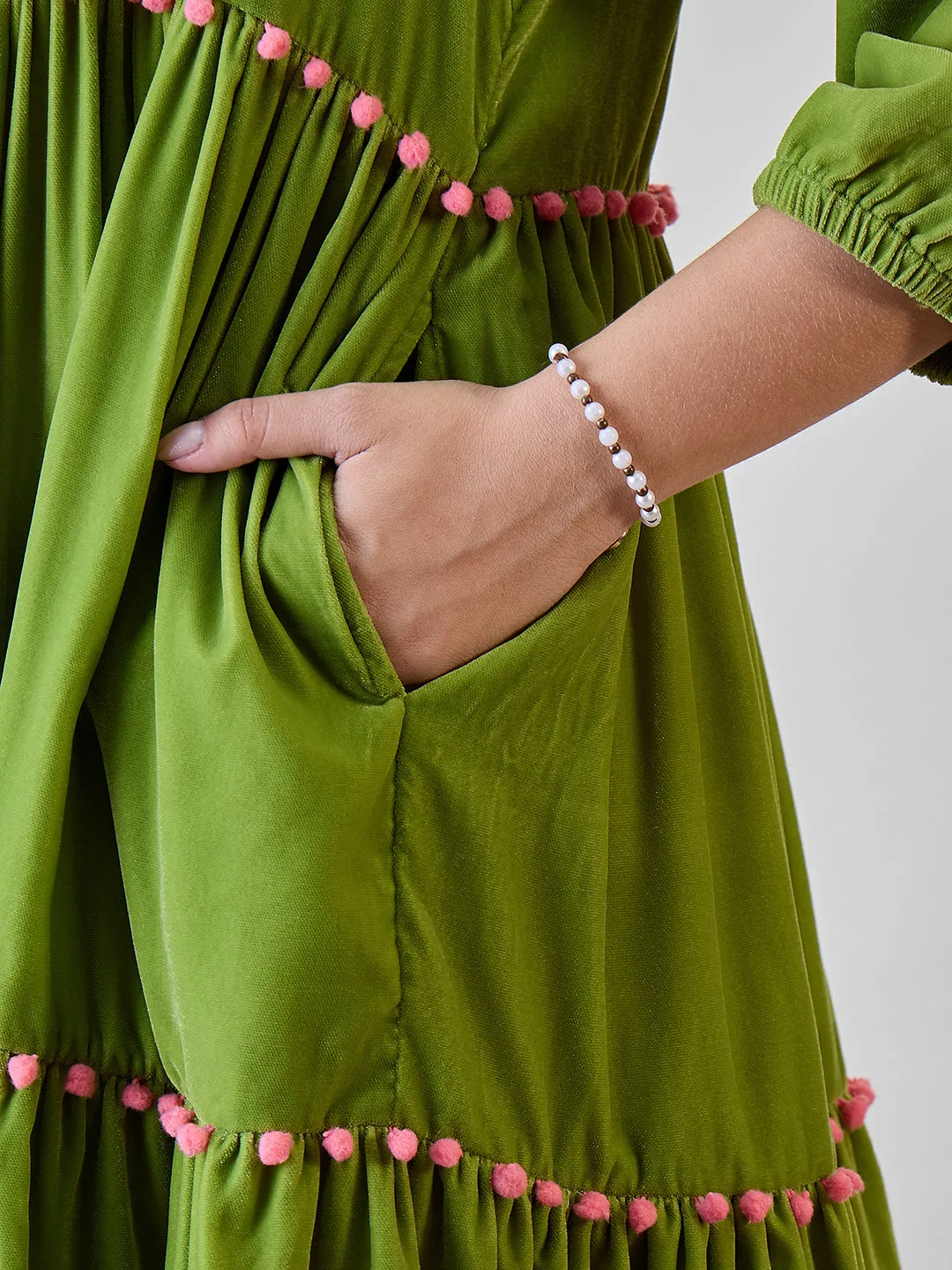 Green Solid Layered Velvet Pom Pom Highlighted Dress